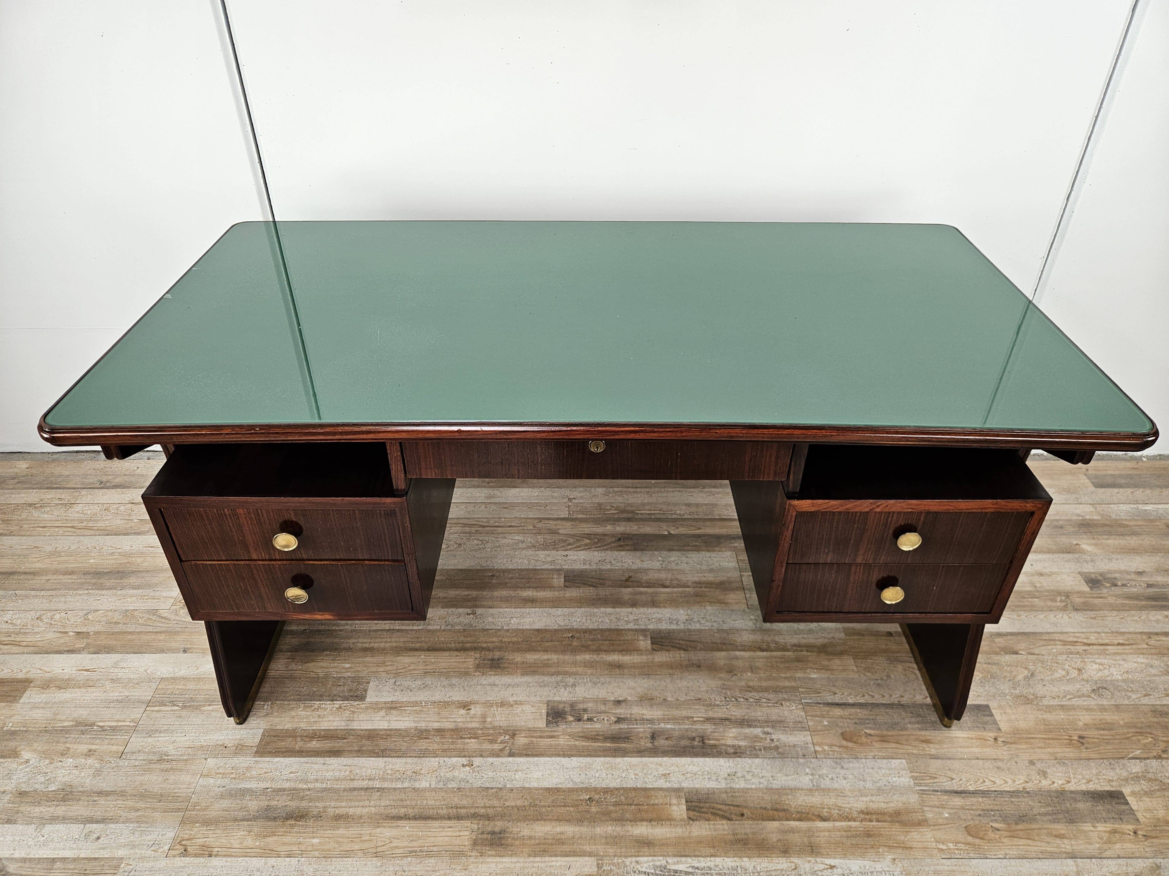 Executive Art Decò desk in exotic wood, glass, and brass