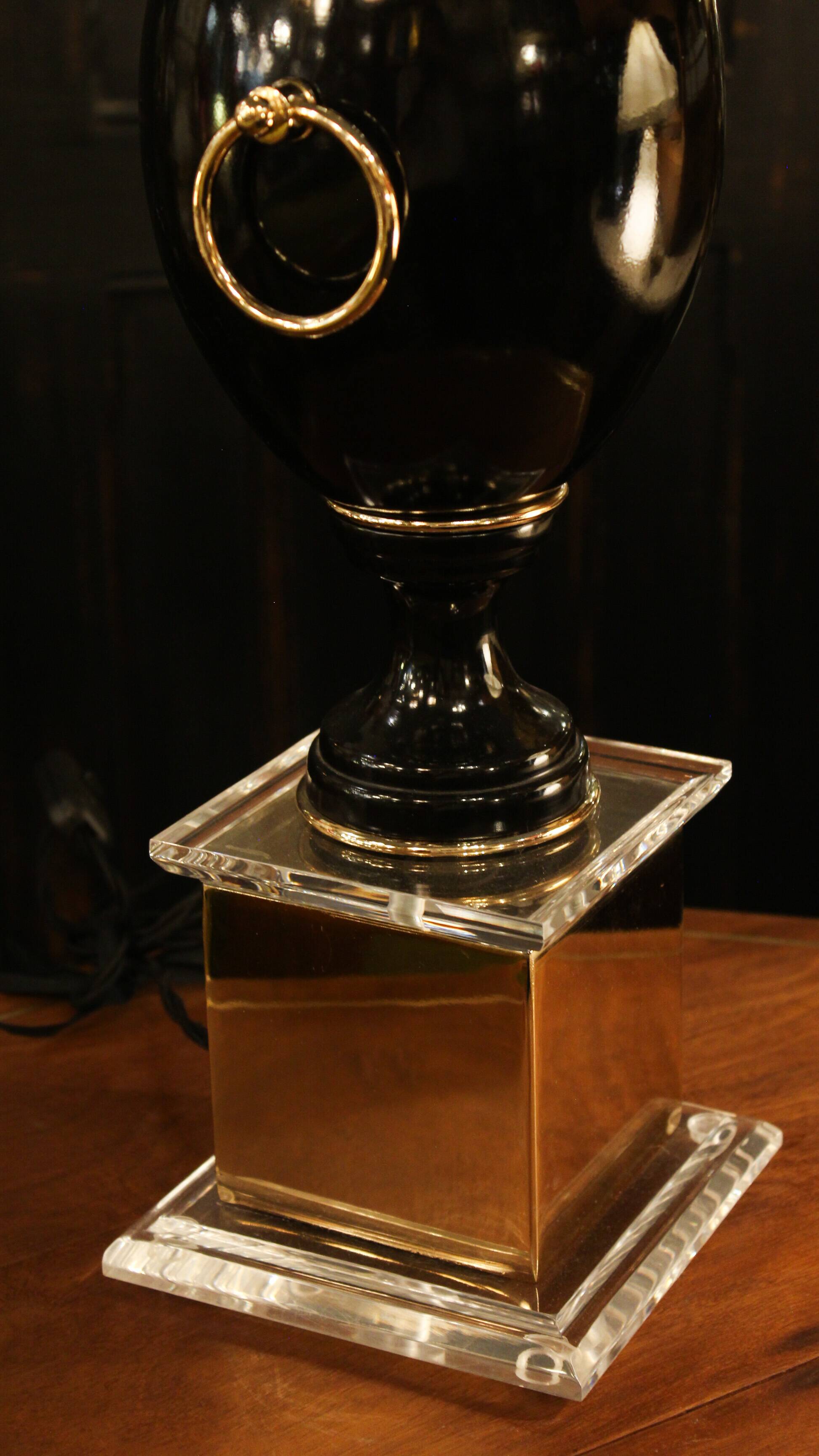 Black lamp in Hollywood Regency style