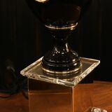 Black lamp in Hollywood Regency style