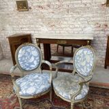 Paire de fauteuils médaillon en bois laqué de style Louis XVI XIXeme