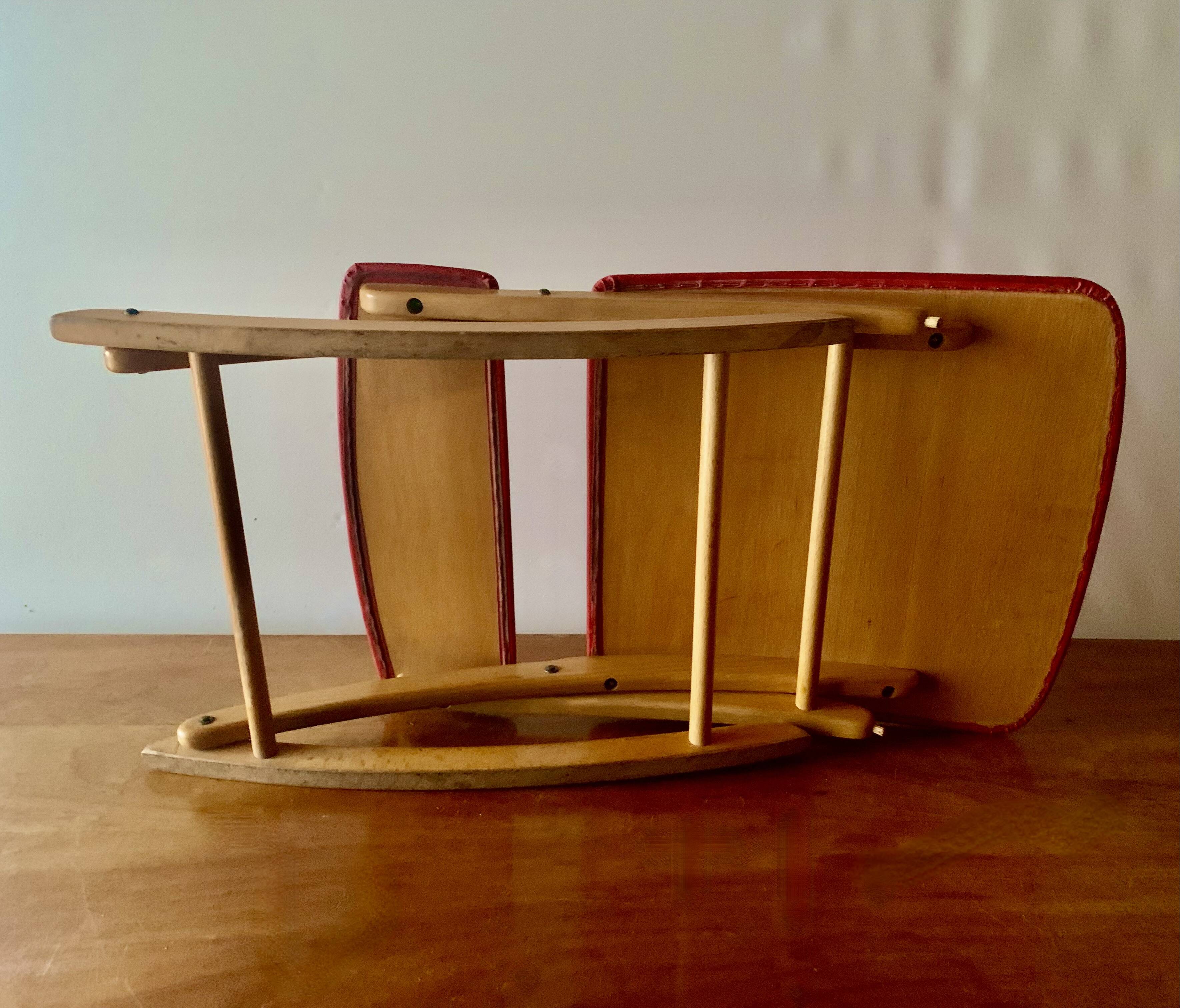 Vintage rocking footstool in red Skai and wood