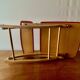 Vintage rocking footstool in red Skai and wood