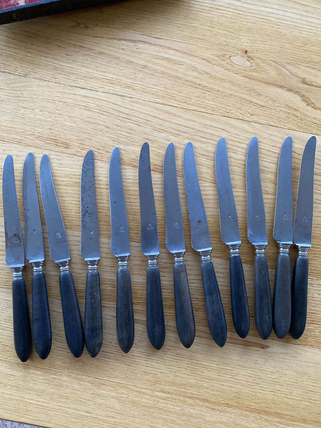 12 knives melted steel ebony handle