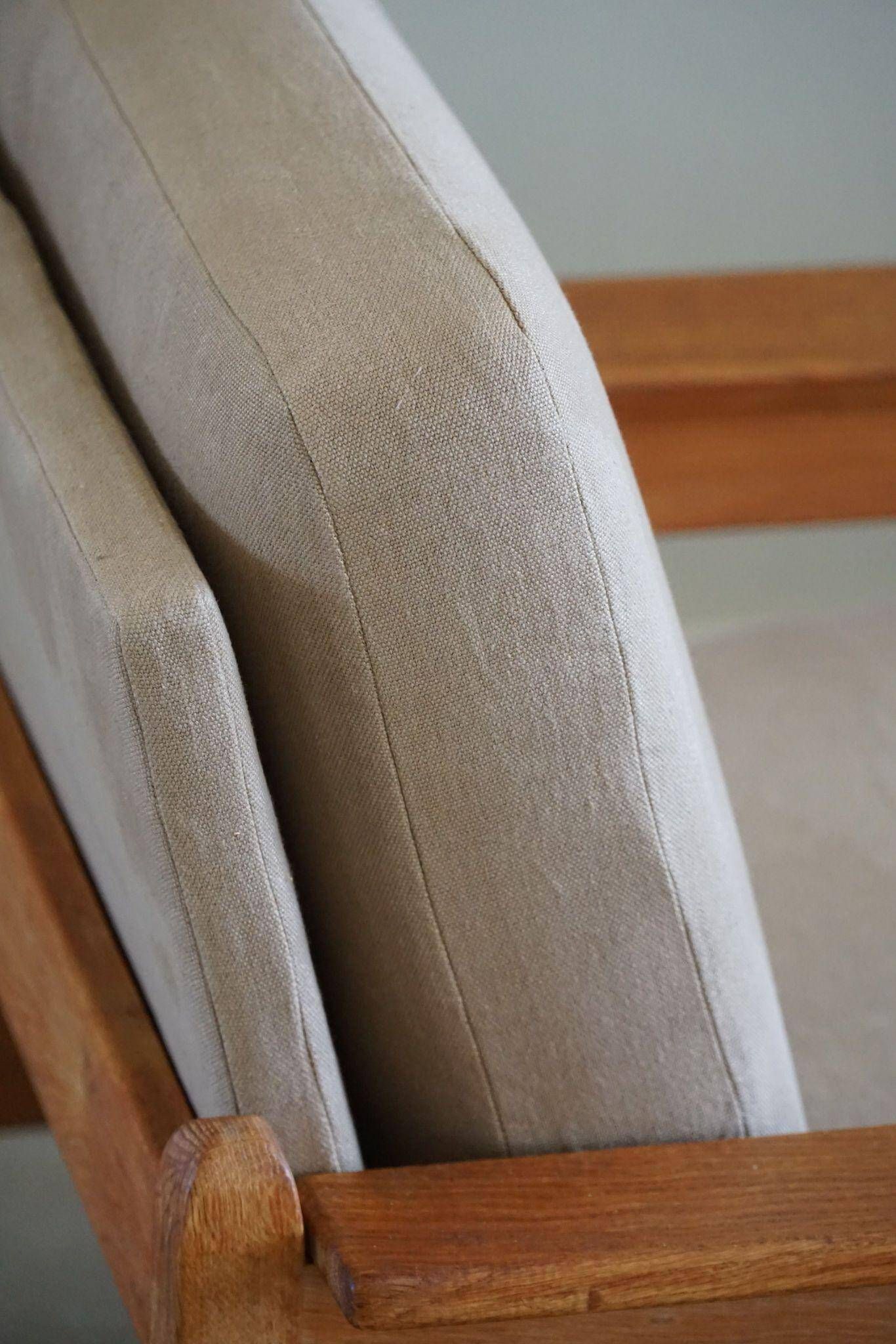 Modern Danish, Pair of Lounge Armchairs in Oak and Linen, Henning Kjærnulf, 1960s