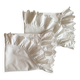 Two half-moon ruffled cushion covers