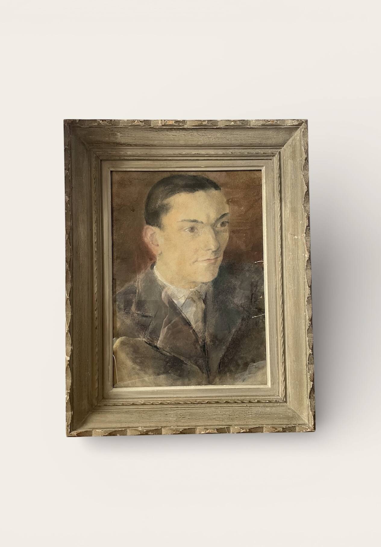 Portrait of a man in pastel under glass, signed, early 20th century.