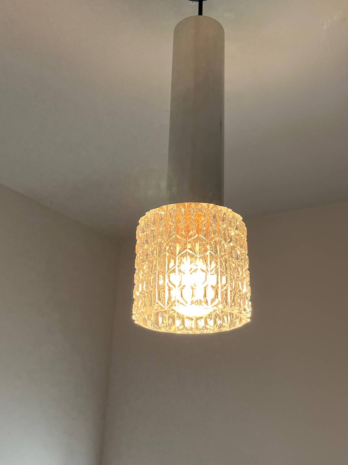 Vintage pendant light in chiseled glass and steel tube from the 70s