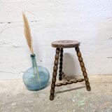 Turned wooden tripod stool