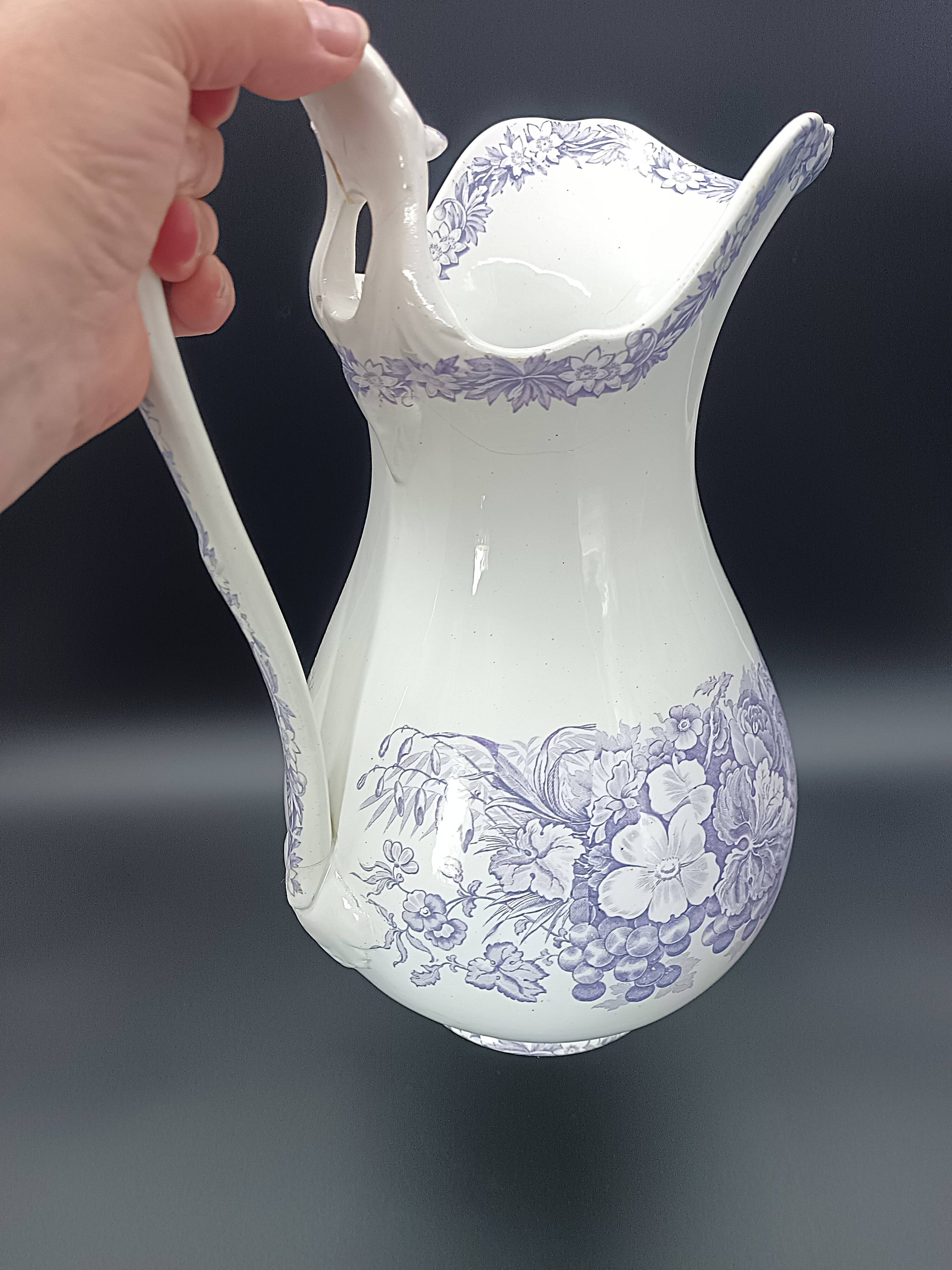 Large antique toilet bowl by Jules Vieillard Bordeaux with violet floral decoration.