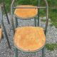 Set of 7 metal chairs by René Herbst with wooden seats.