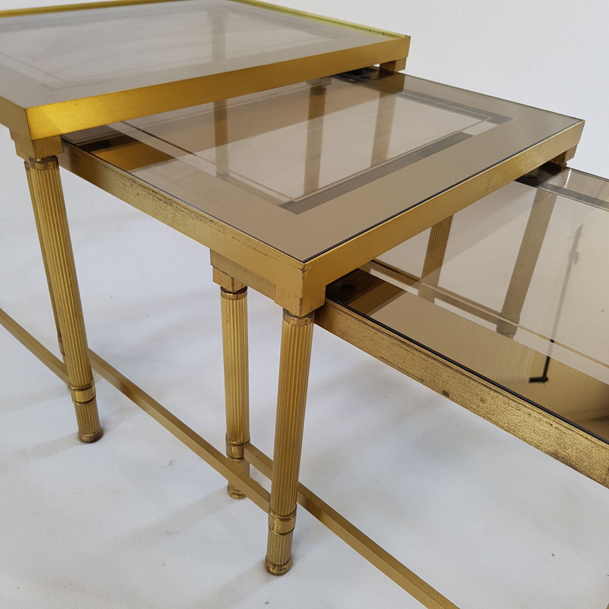 Brass pull-out tables