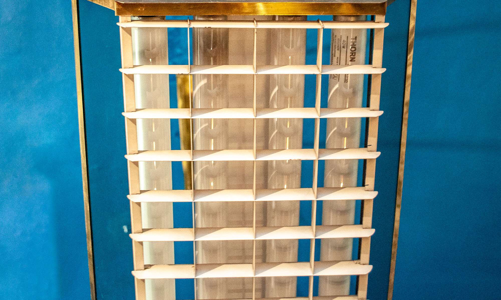 Four brass, aluminum and plexiglas ceiling panels. Italy 1950s