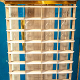 Four brass, aluminum and plexiglas ceiling panels. Italy 1950s