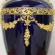 Vase signed Legastelois in blue ceramic of Sèvres and gilded bronze