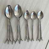 Set of 20 stainless steel cutlery with branch pattern.