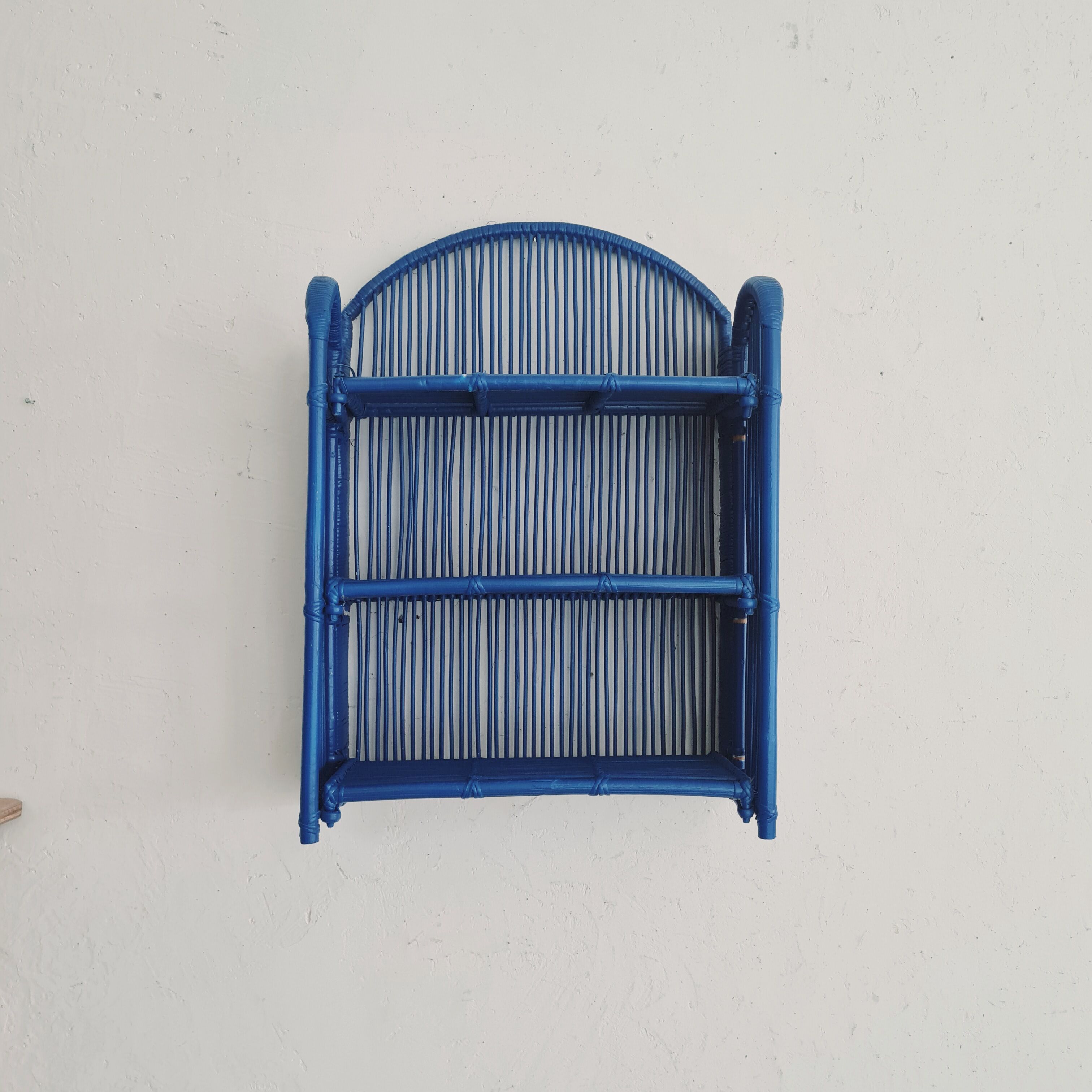 Vintage shelf in Klein blue rattan