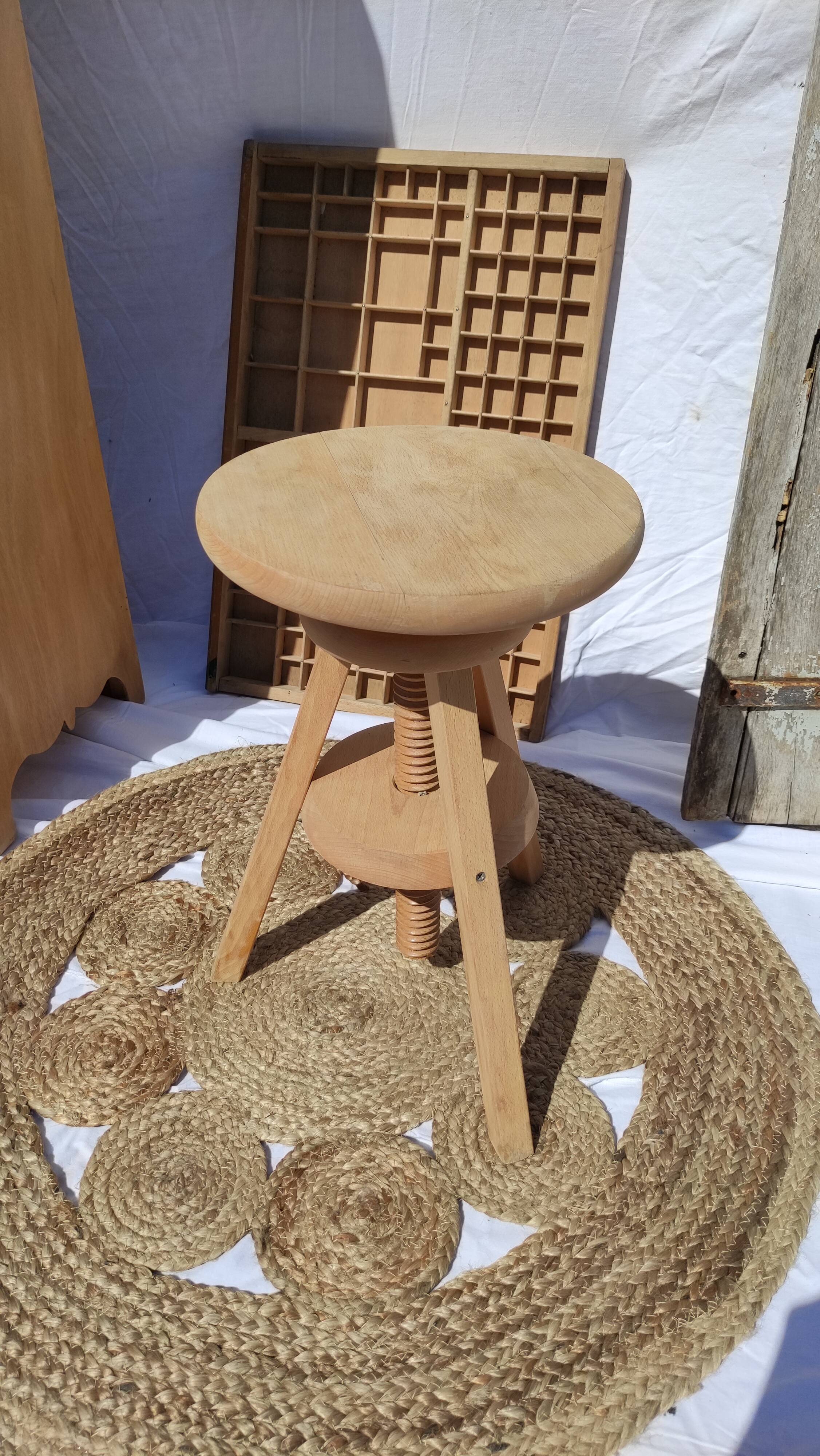 Vintage wooden stool with screws