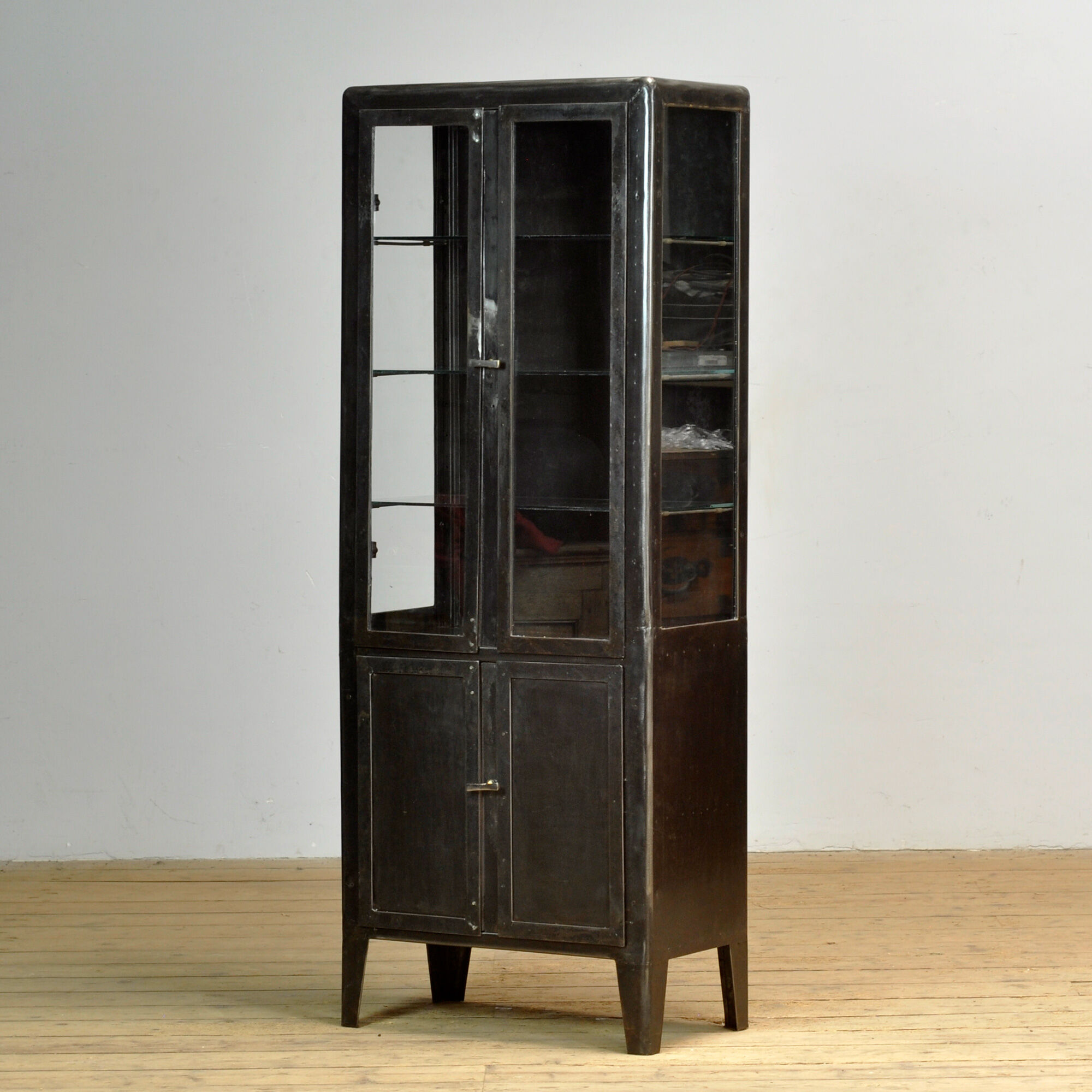 Polished iron medicine cabinet, 1930s