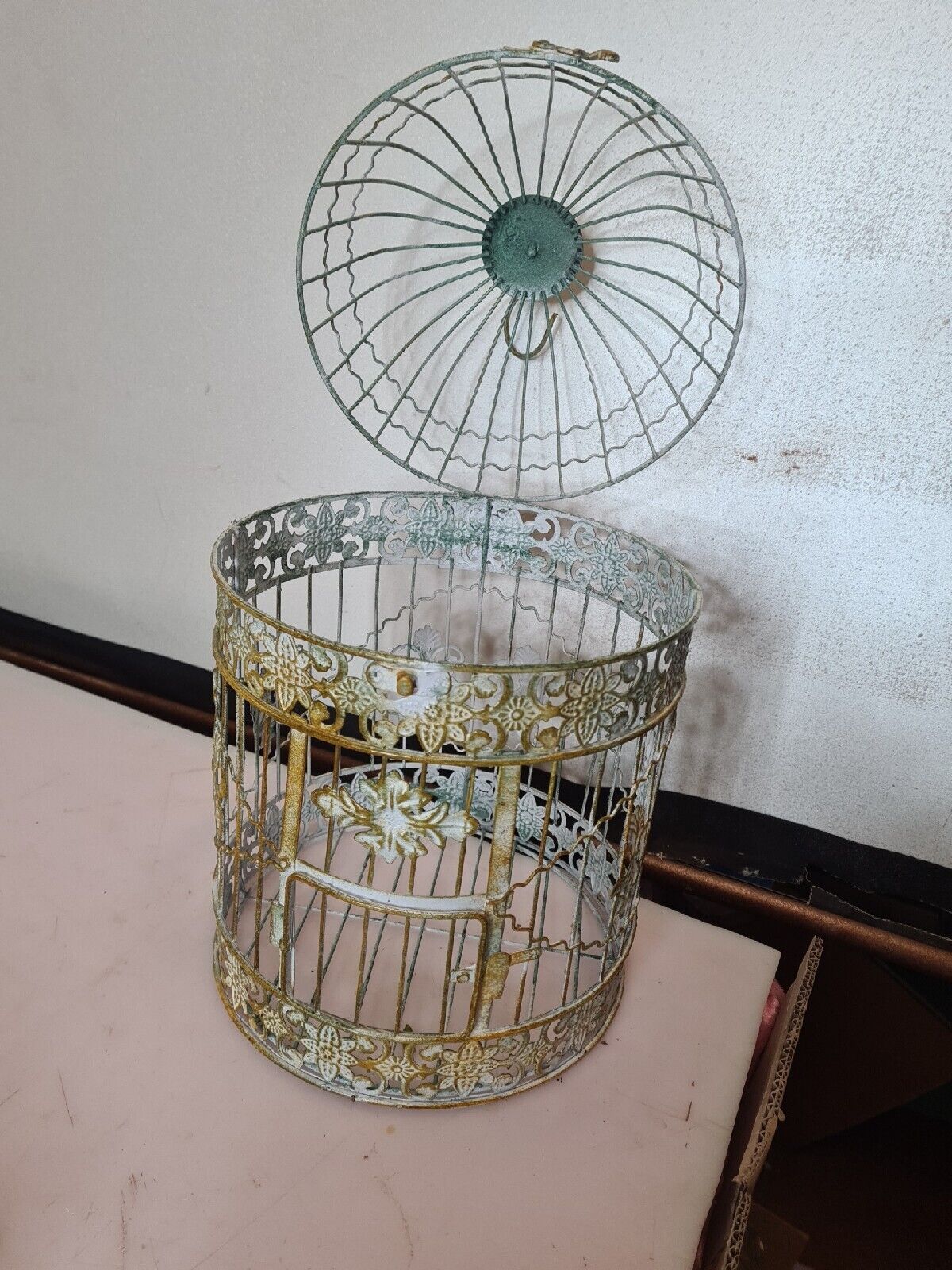 Weathered iron birdcage