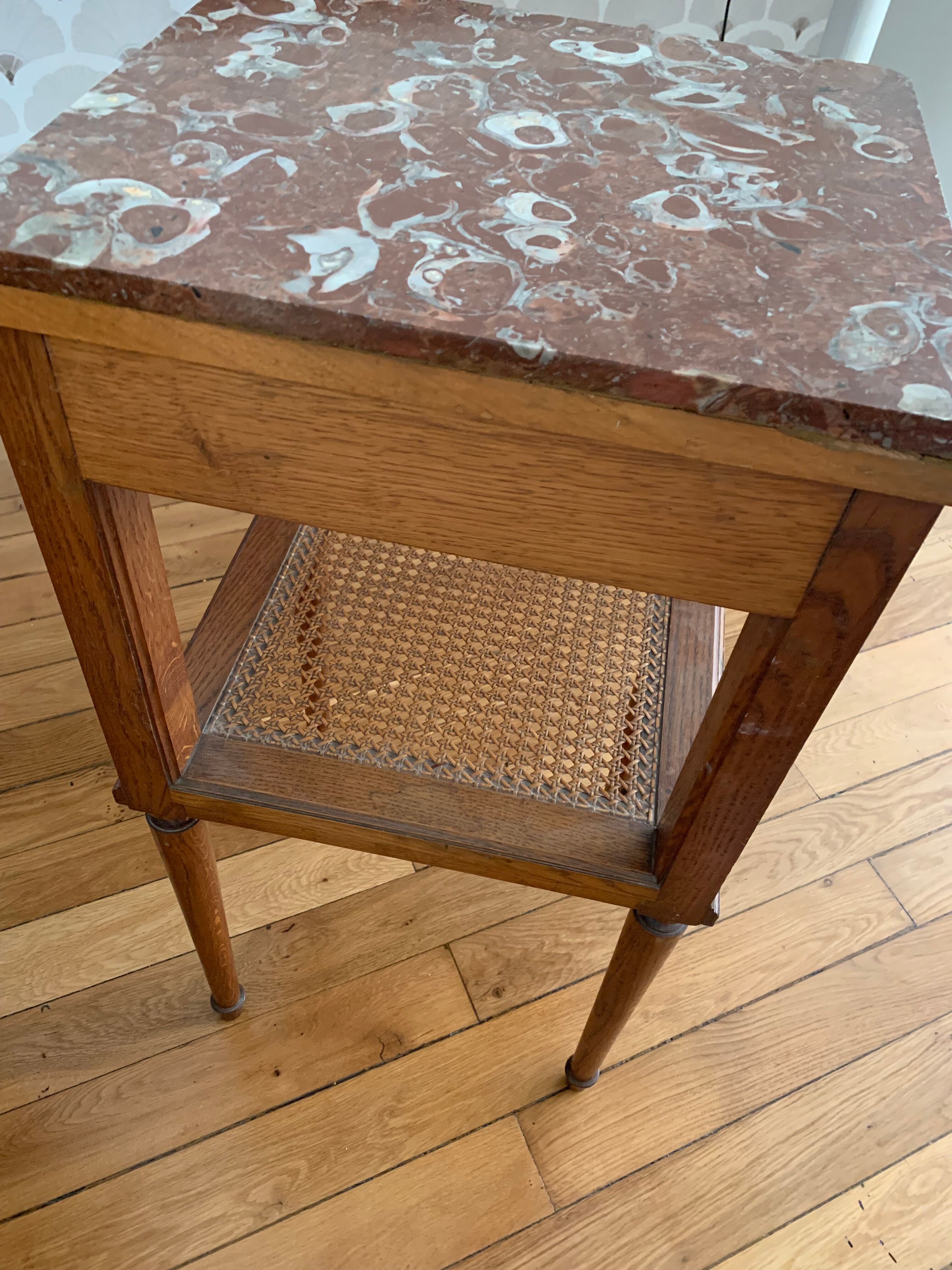 Pair of high marble and walnut bedside tables