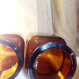 Duo of vintage apothecary bottles in amber glass