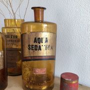 Old bottle of pharmacy "aqua sedativa" brown glass
