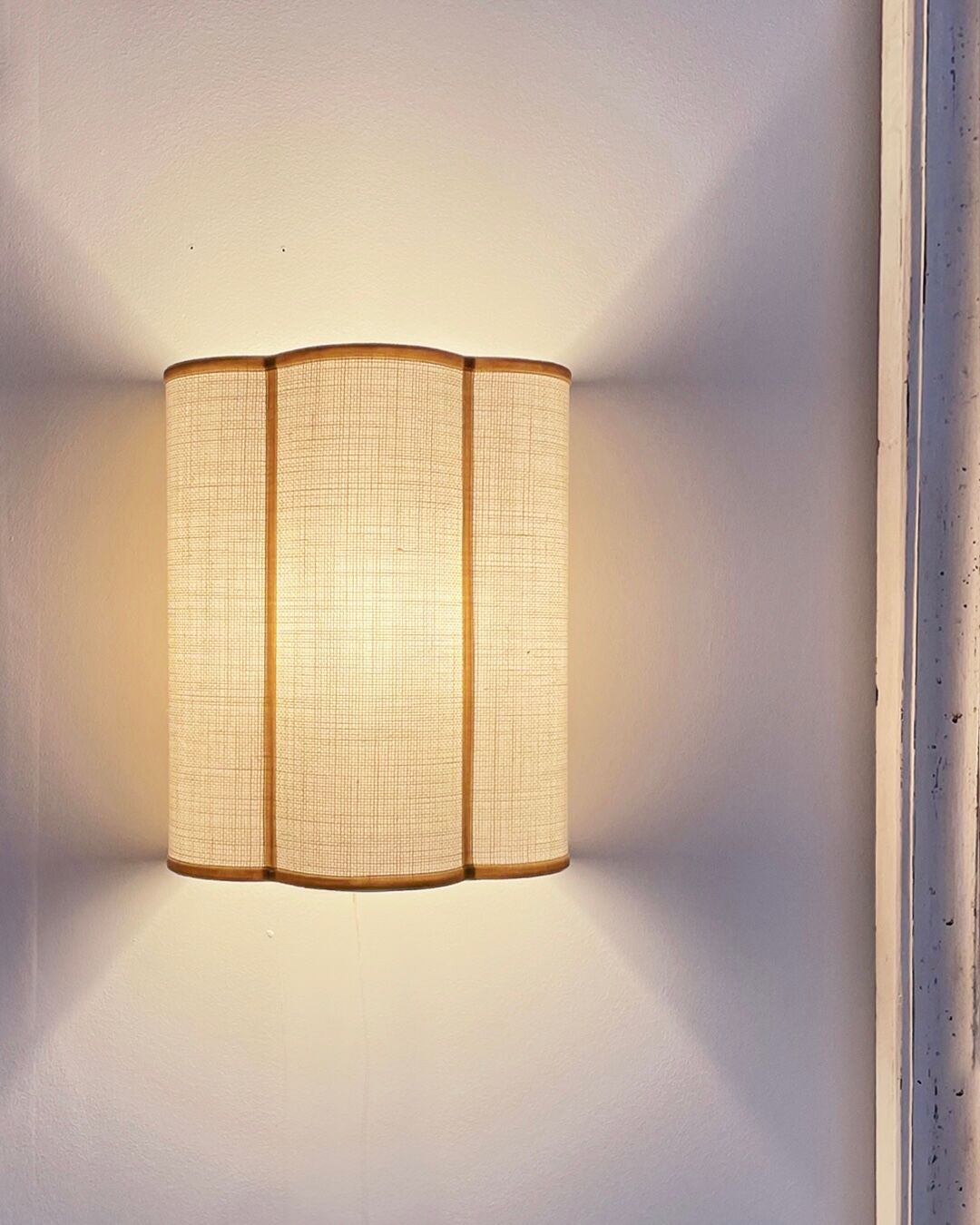 Cream jute wall sconces and bronze velvet trims