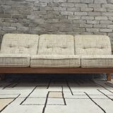 Danish canapé and its 1970s teak armchair