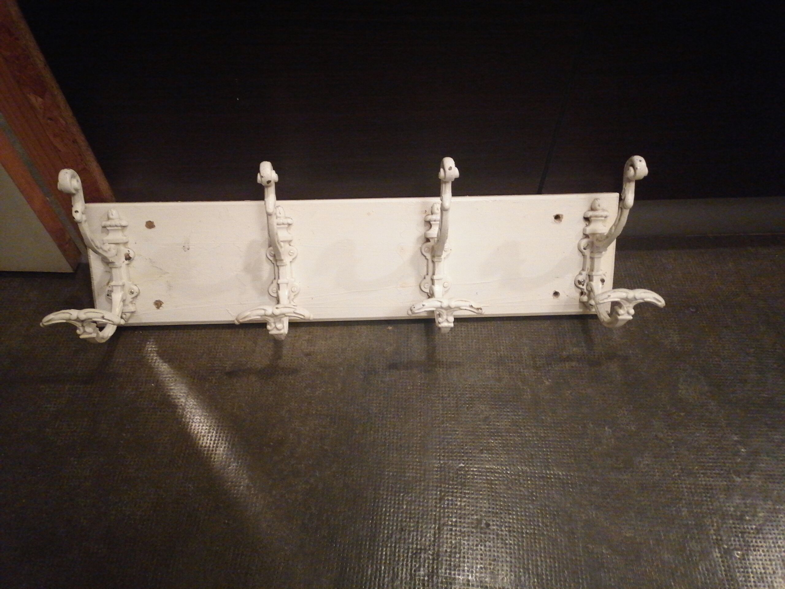 Coat rack with 4 old wrought iron and wooden hooks