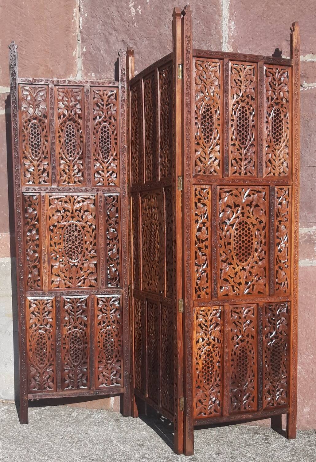 Carved solid wood screen.