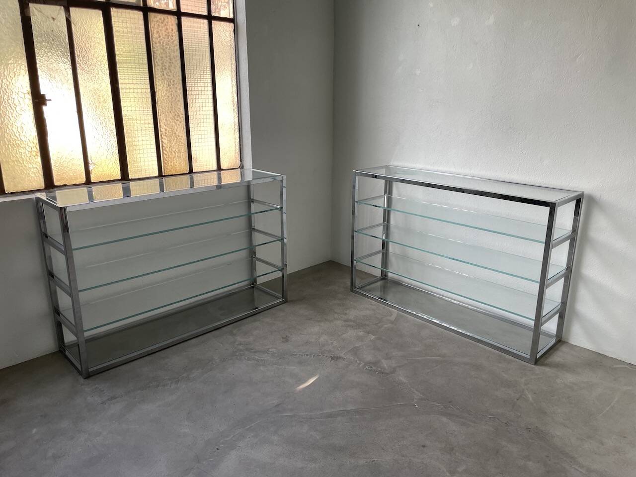 Pair of chrome and glass shelves from the 70s