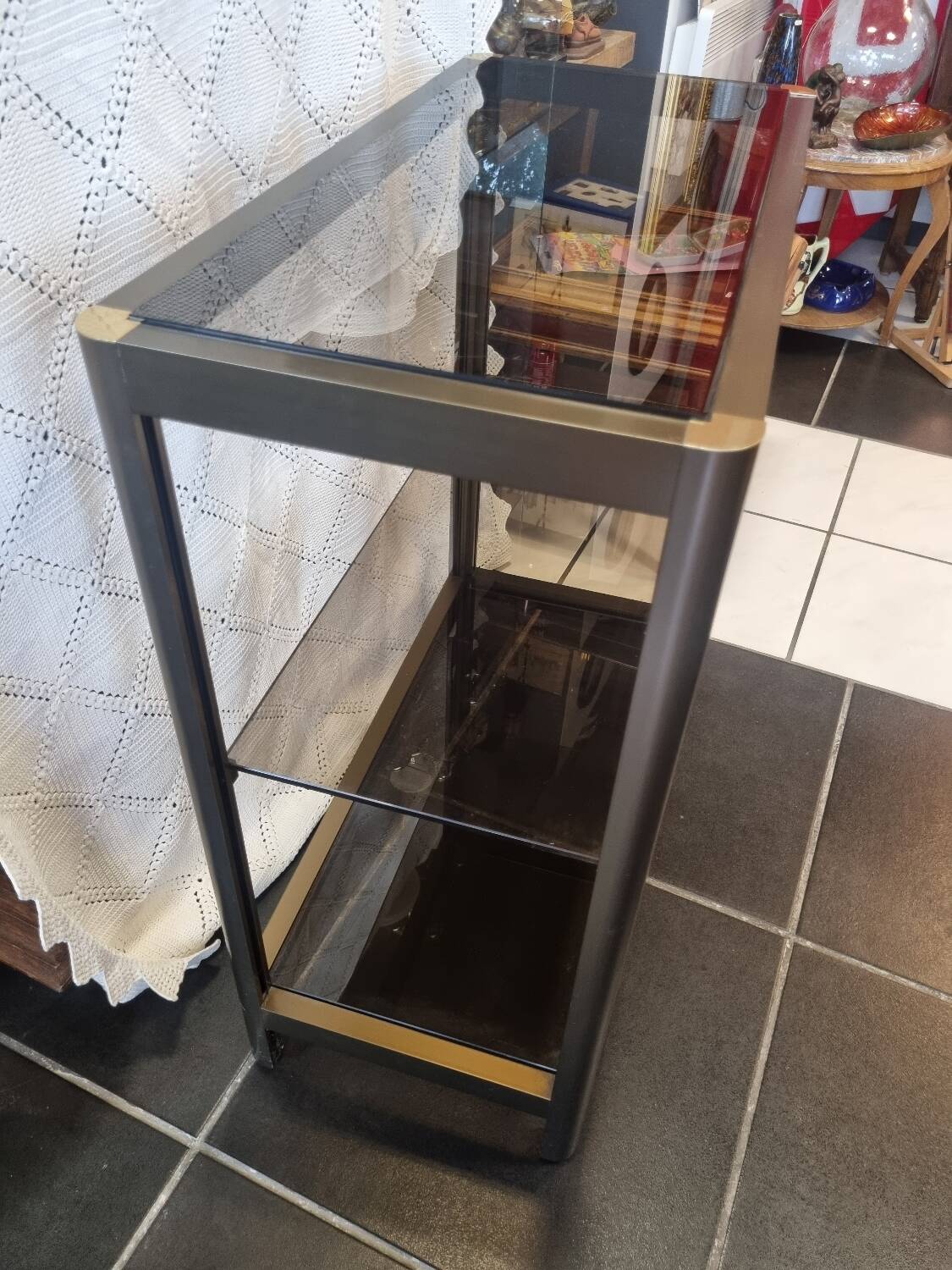 Vintage smoked glass console design