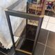 Vintage smoked glass console design