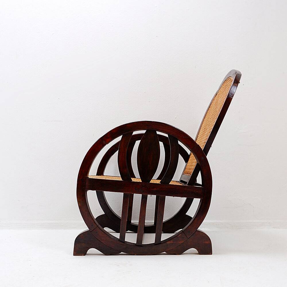 Art Deco armchairs in wood, with cane seat and backrest, circa 1930.