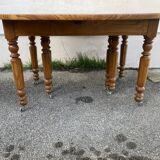 8-legged ash table with 6 extensions.
