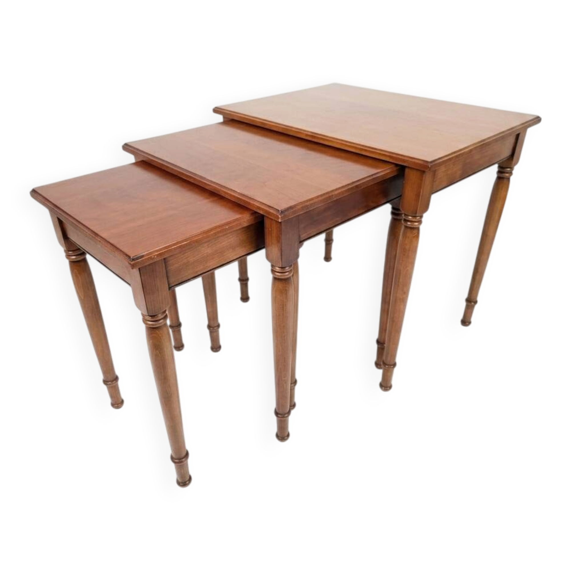 Nest of tables in solid cherry wood from the mid-20th century.