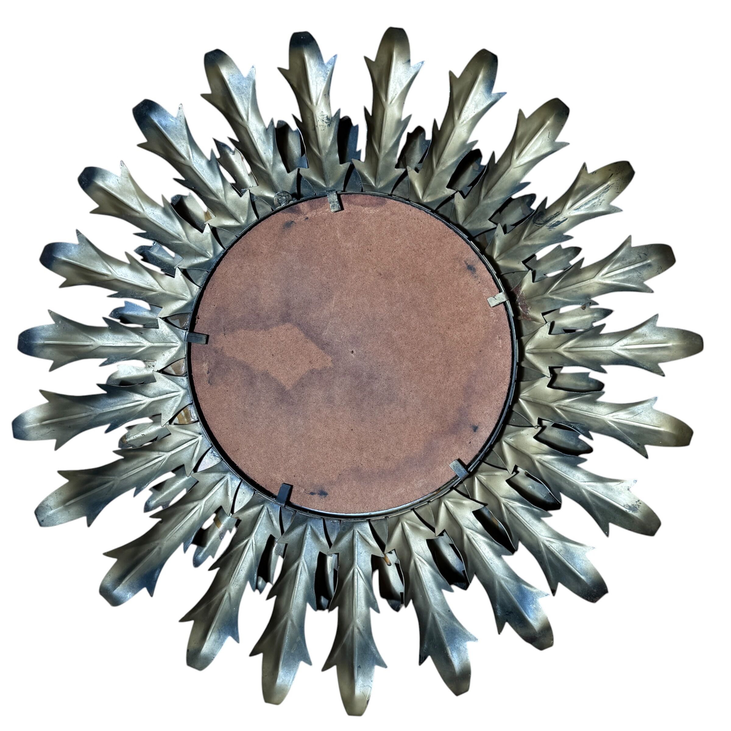 Sun mirror in wrought iron from the 1950s Italy.