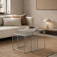 Nest of silver metal side tables