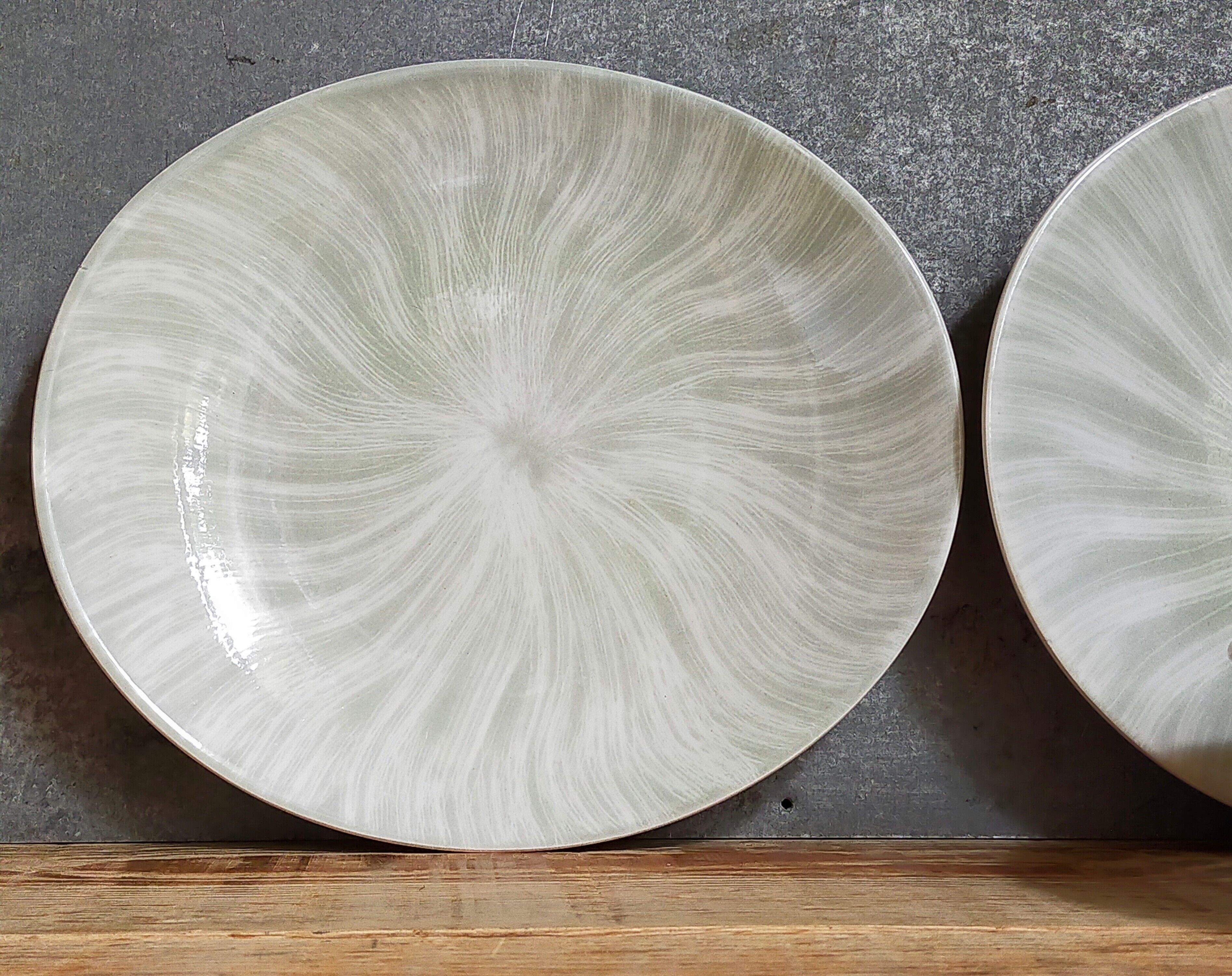 Nine earthenware plates from Salins-les-Bains vintage