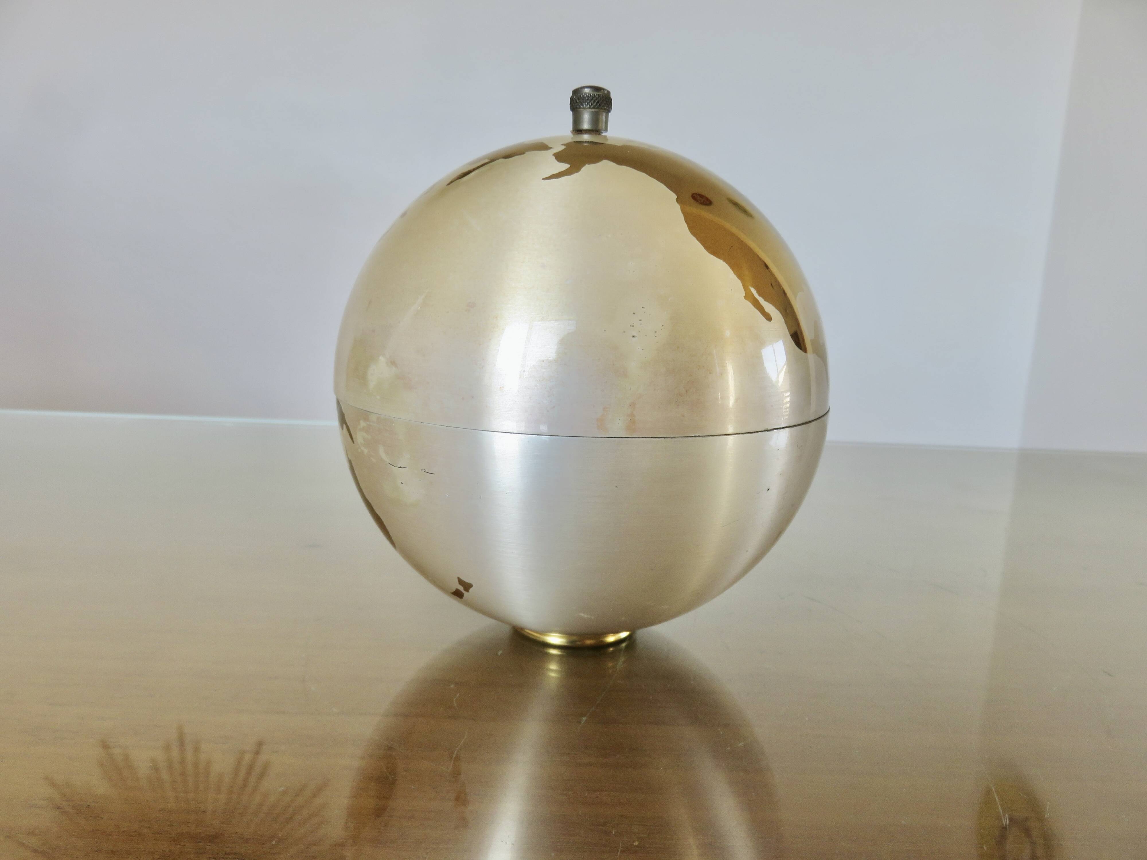 Large terrestrial globe, cigarette dispenser, brass, 1960 - 1970