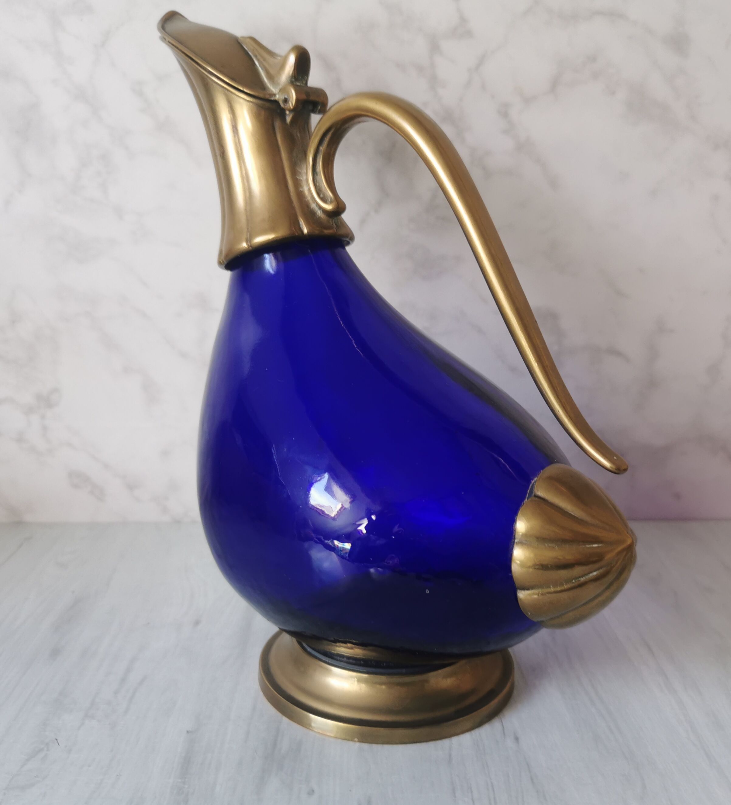 Glass and brass decanter