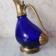 Glass and brass decanter
