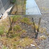 Table basse chrome et verre fumé