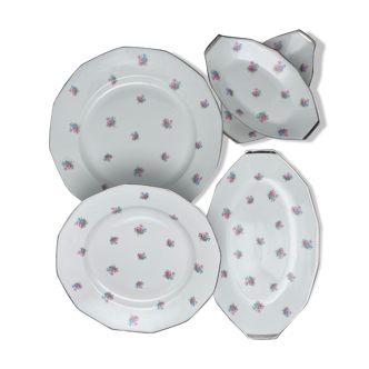 Serving dishes in small-flowered porcelain and silver edging and