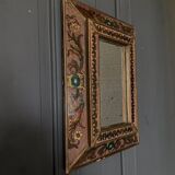 Small beaded mirror decorated with arabesques mid-20th century