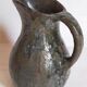 Potter's pitcher Art-popular in old enamelled earth