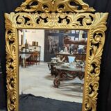 Large italian mirror in carved and gilded wood