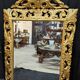 Large Italian mirror in carved and gilded wood