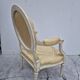 Louis XVI style cabriolet armchair with decorated medallion