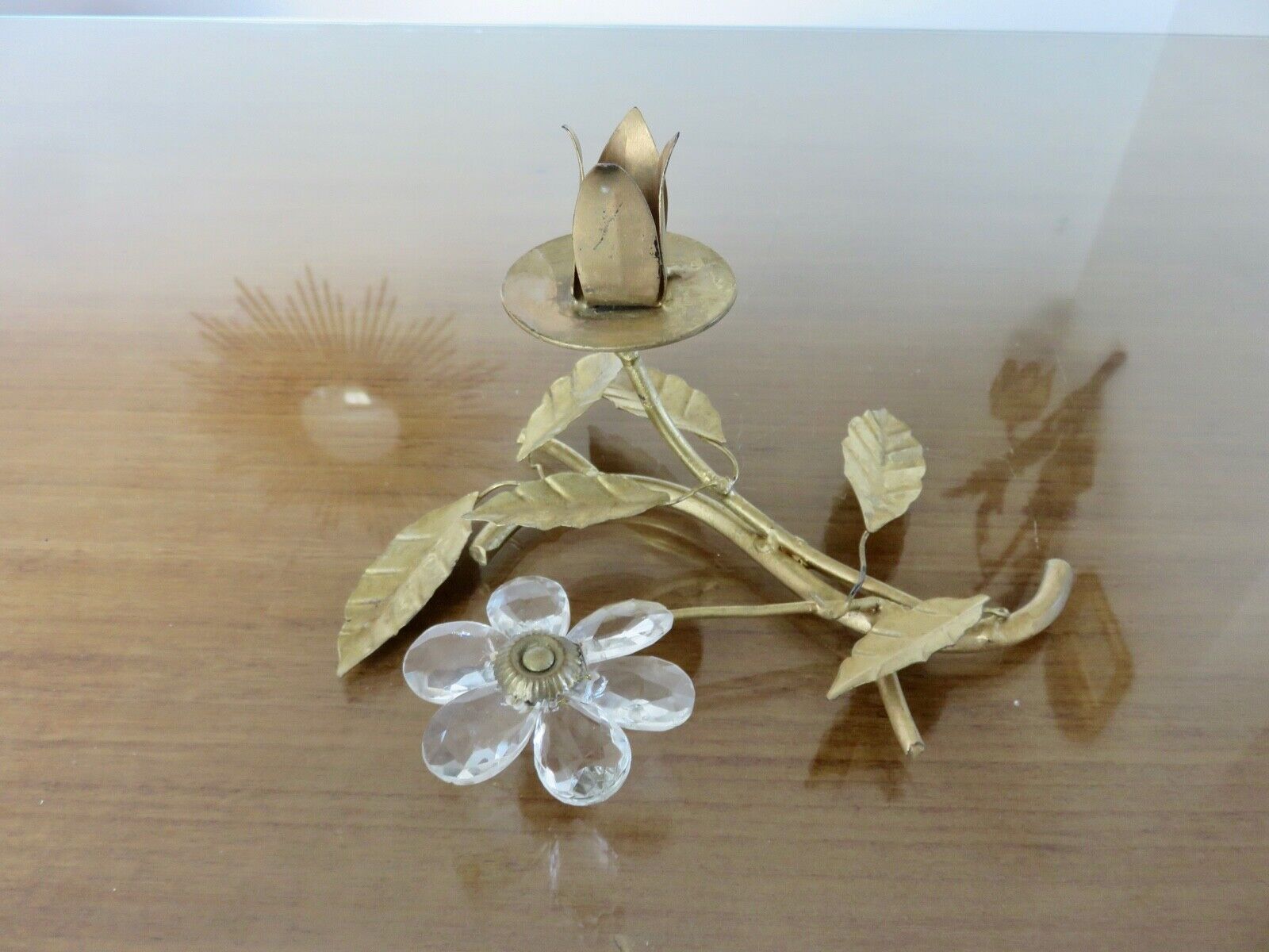 Pair of gilded metal candle holders and tassels